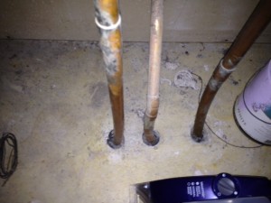 Active water pipes in concrete slab
